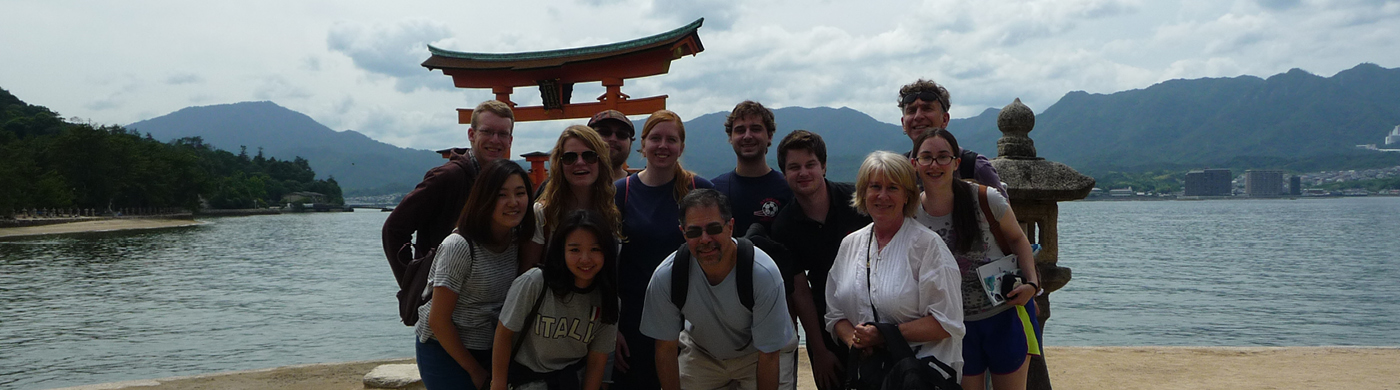 Andrew Dell'Olio with students in Japan