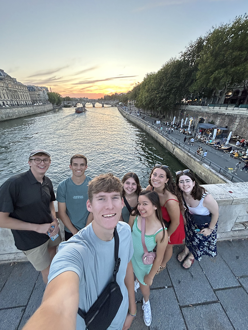 A group of Hope engineering students posing for a selfie on a bridge in Europe