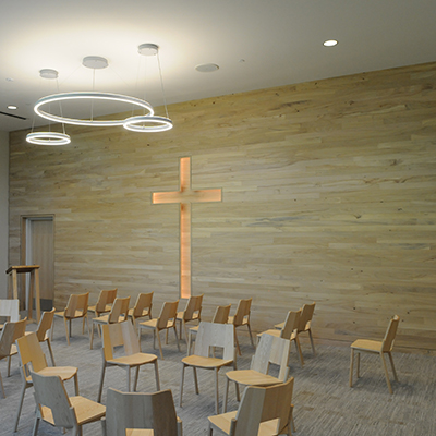 wall in chapel made of wood from trees that had blown down